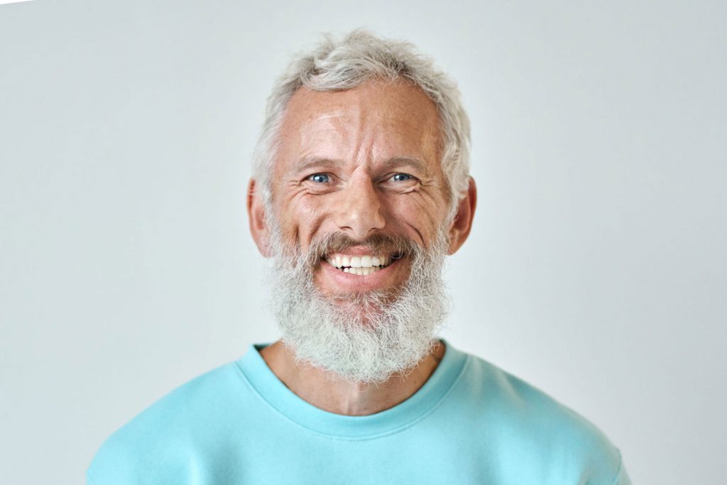 Headshot of a middle aged male dressed casually.